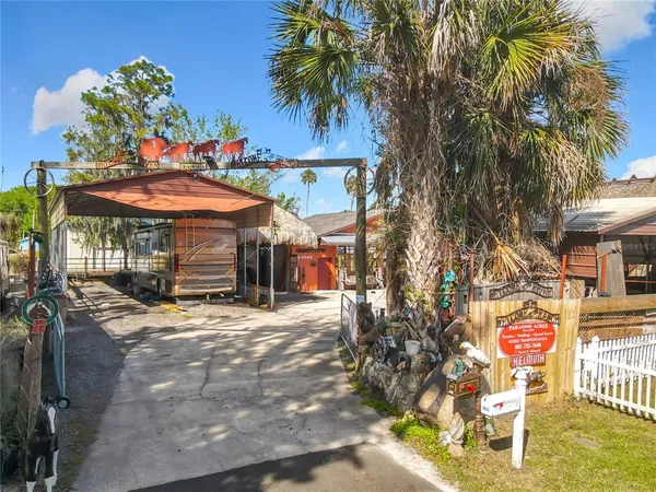 a living room with furniture fireplace and a flat screen tv