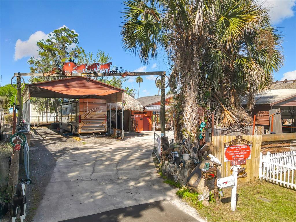 24545 Snail Road Astor, FL 32102 - Photo 7 of 61 a view of a street with sitting area