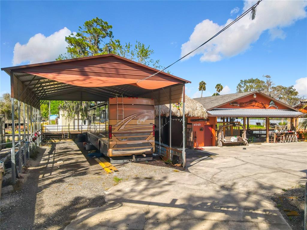 24545 Snail Road Astor, FL 32102 - Photo 8 of 61 a view of a patio