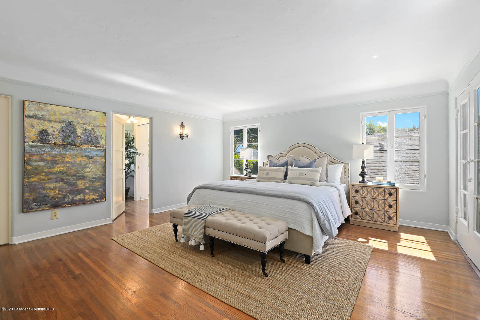 943 Cabrillo Drive Glendale, CA 91207 - Photo 12 of 13 a bedroom with a bed lamp and window