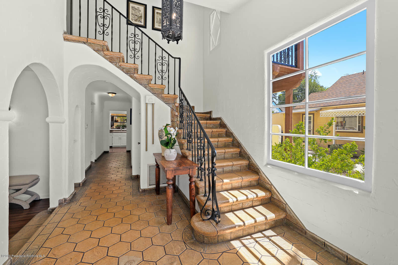 943 Cabrillo Drive Glendale, CA 91207 - Photo 3 of 13 a view of staircase with white walls and furniture