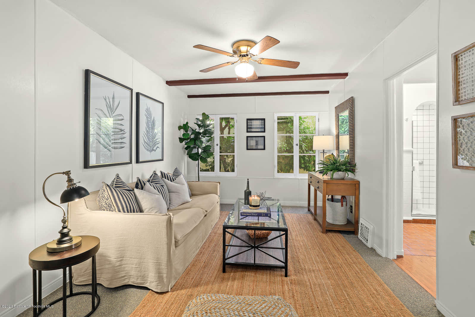 943 Cabrillo Drive Glendale, CA 91207 - Photo 6 of 13 a living room with furniture and a large window