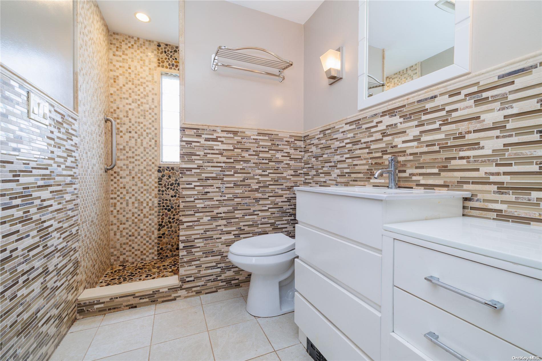 43 Brookfield Road Valley Stream, NY 11581 - Photo 1 of 1 Beautifully Updated Bathroom