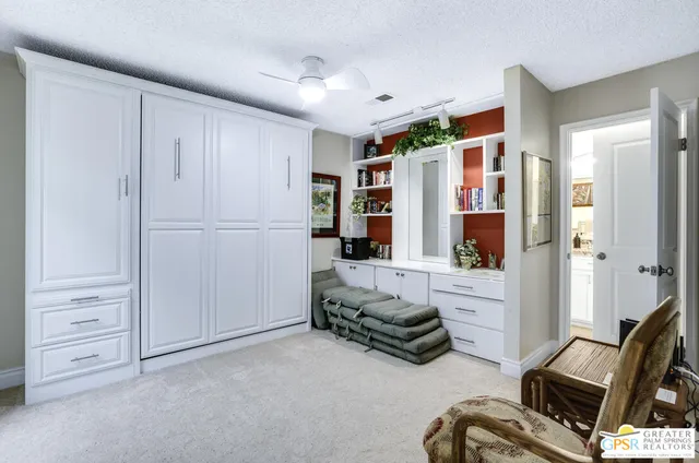 a view of livingroom with furniture and windows