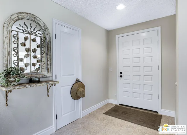 a view of front door with entryway