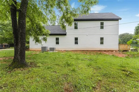 a house view with a garden space