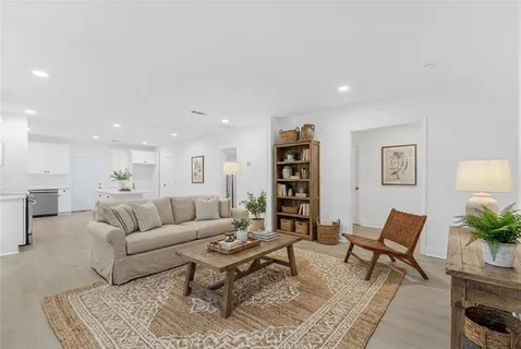 a living room with furniture and a couch