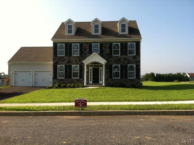 4110 Walter Road Bethlehem, PA 18020 - Photo 1 of 6 a front view of a house with a garden