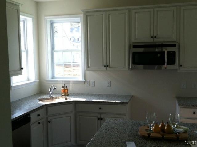4110 Walter Road Bethlehem, PA 18020 - Photo 5 of 6 a kitchen with a sink cabinets and window