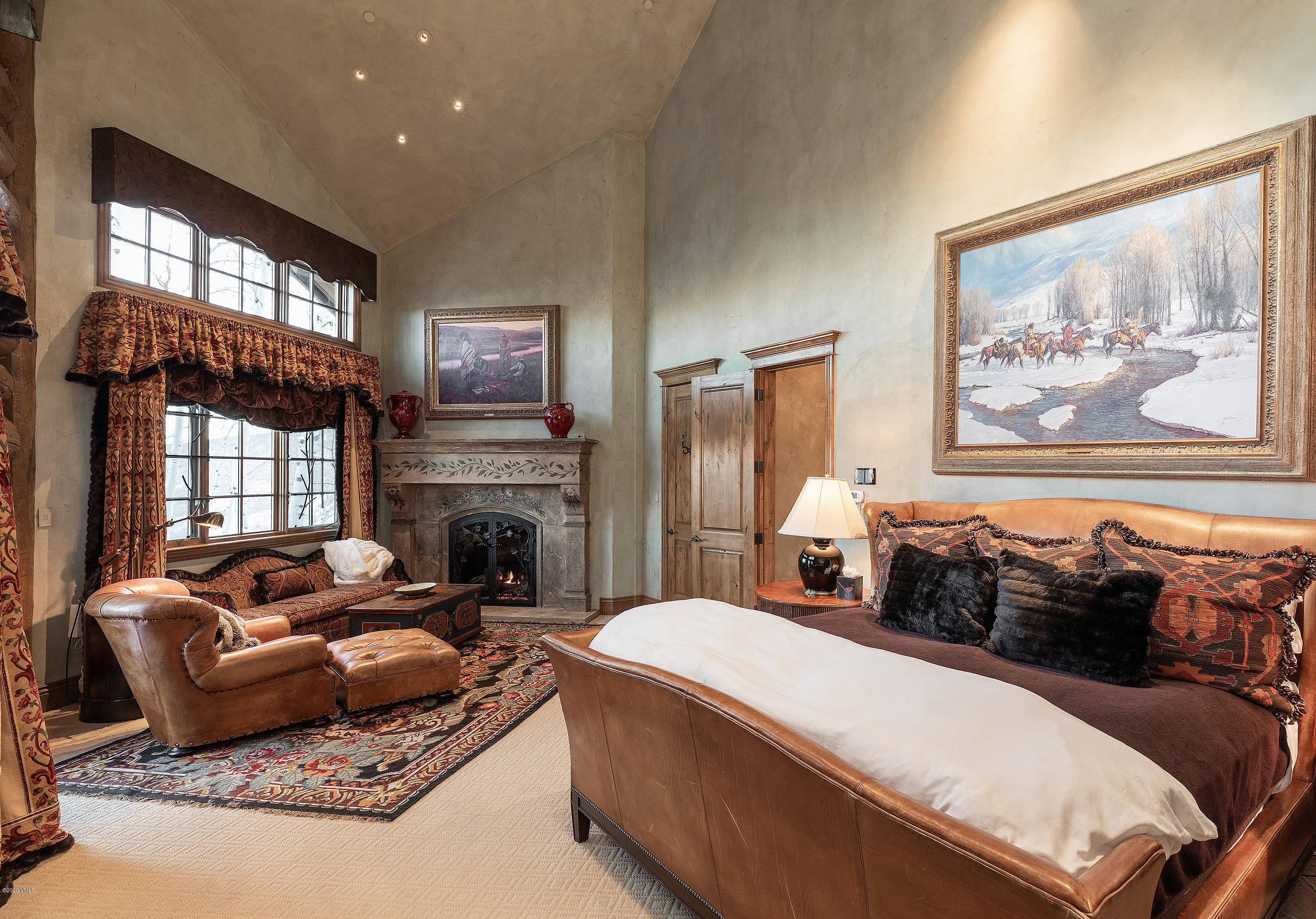 3389 Daybreak Ridge Road Avon, CO 81620 - Photo 12 of 24 a spacious bedroom with a bed and furniture