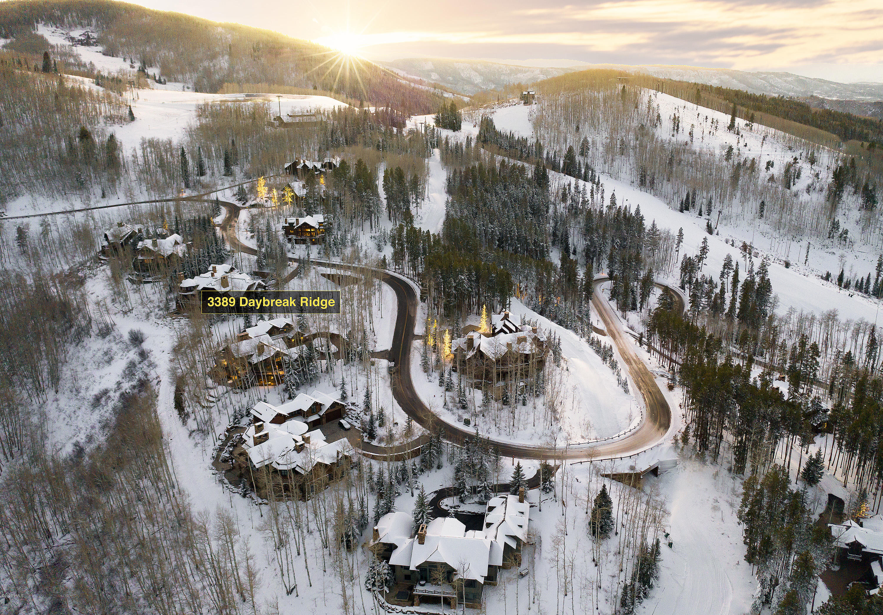 3389 Daybreak Ridge Road Avon, CO 81620 - Photo 20 of 24 a picture of a table and chairs with wooden floor