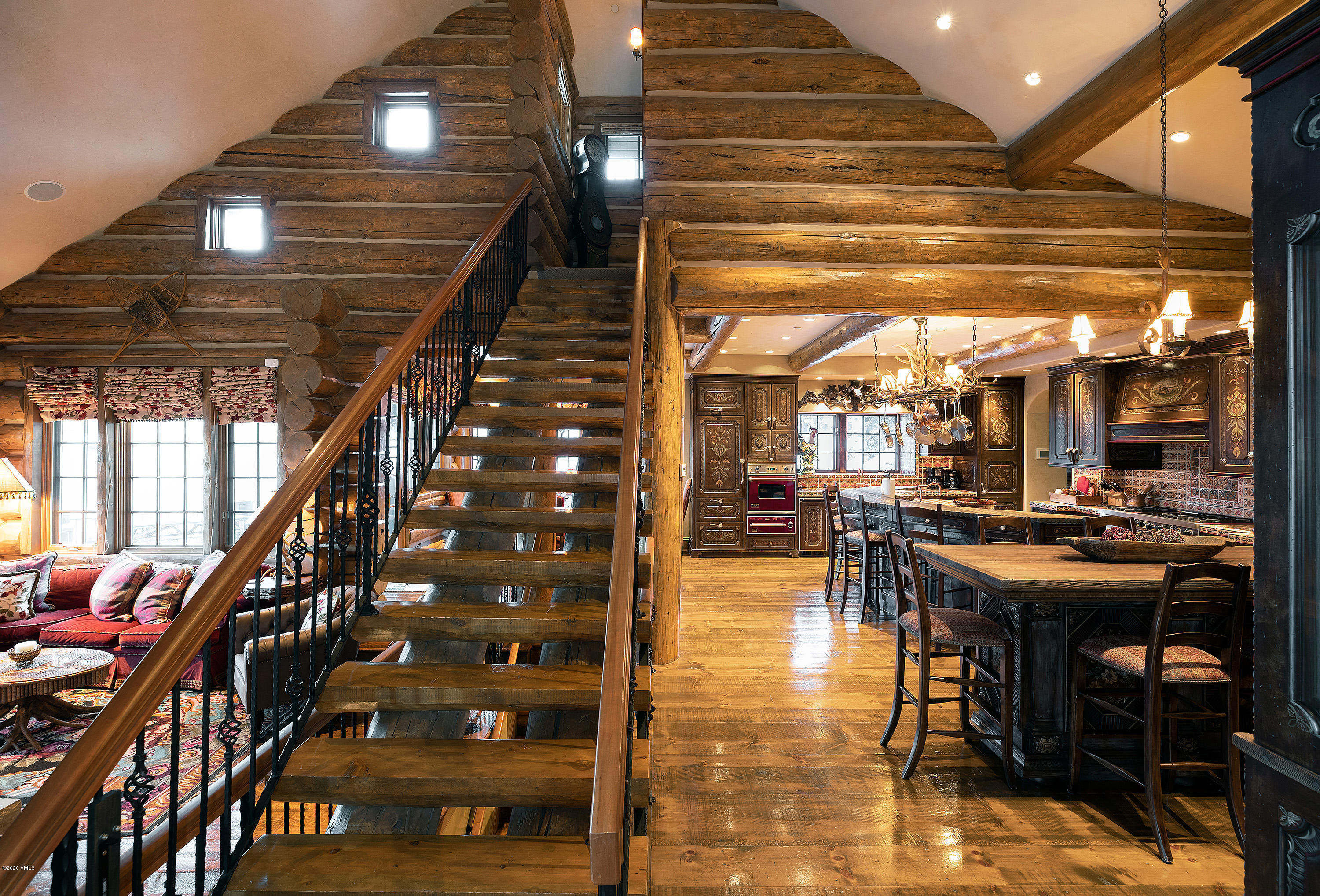 3389 Daybreak Ridge Road Avon, CO 81620 - Photo 8 of 24 a dining room with furniture and wooden floor