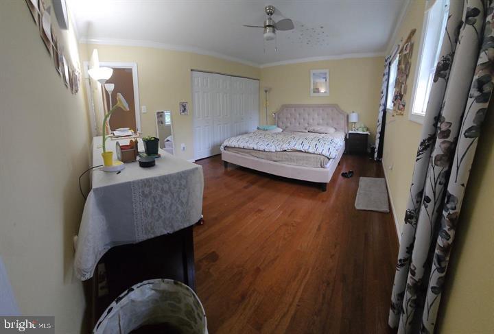 17404 Hughes Road Poolesville, MD 20837 - Photo 14 of 15 Serene bedroom with warm hues.