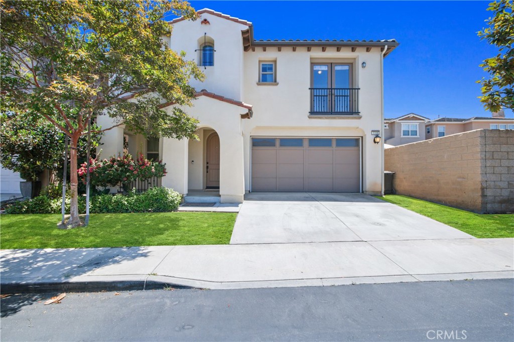 3318 View Ridge Drive Long Beach, CA 90804 - Photo 1 of 1 a front view of a house with a yard and garage