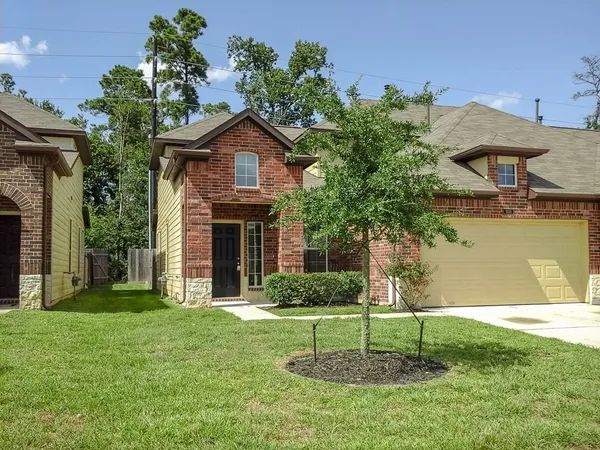 a house view with a garden space