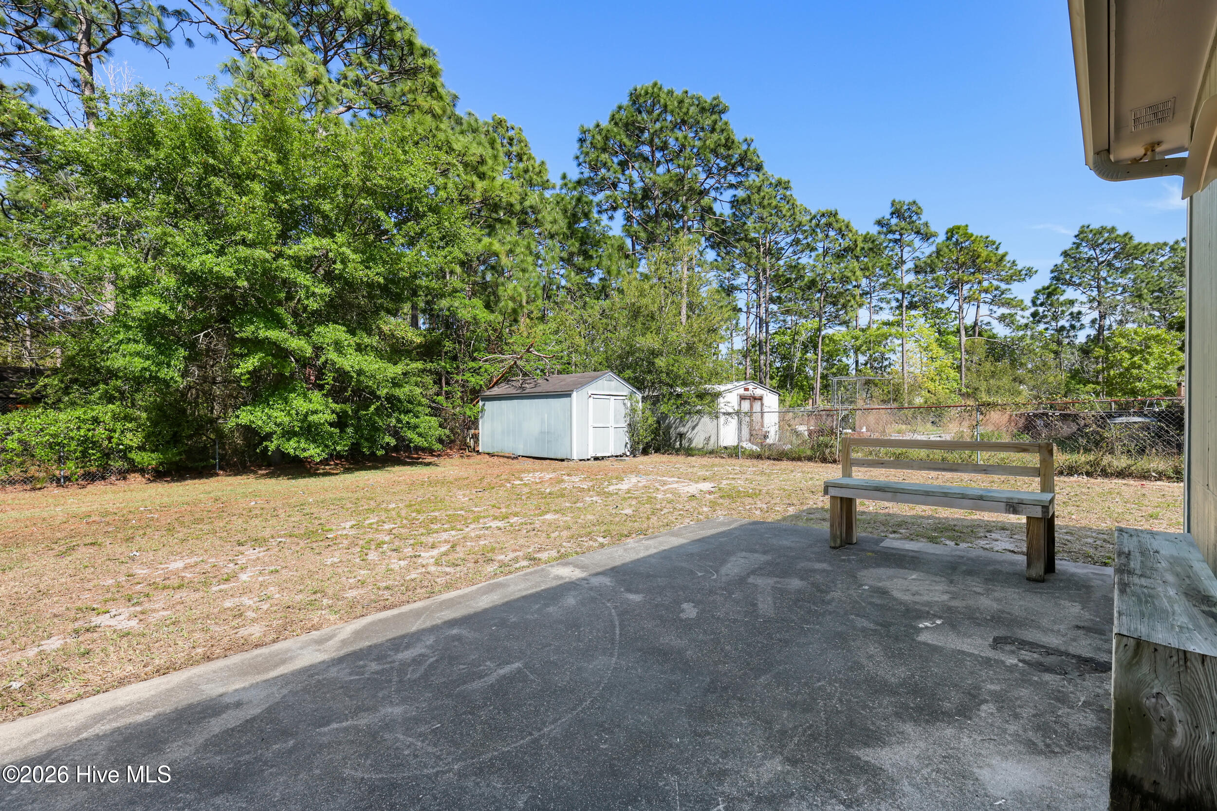 1021 Filmore Road Southport, NC 28461 - Photo 26 of 88 Back patio + backyard