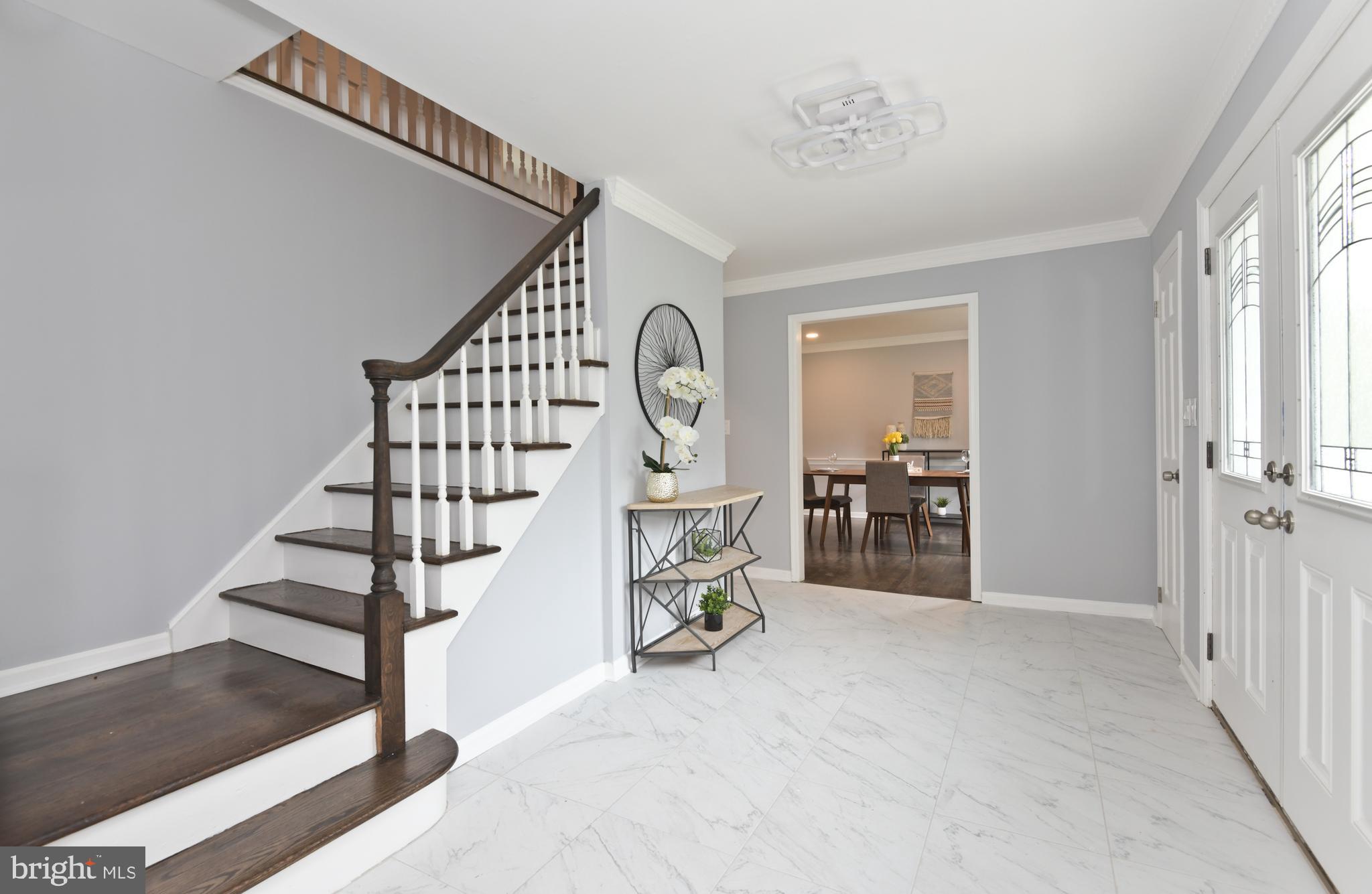 71 Carter Road Lawrence Township, NJ 08648 - Photo 19 of 33 a view of an entryway with wooden floor
