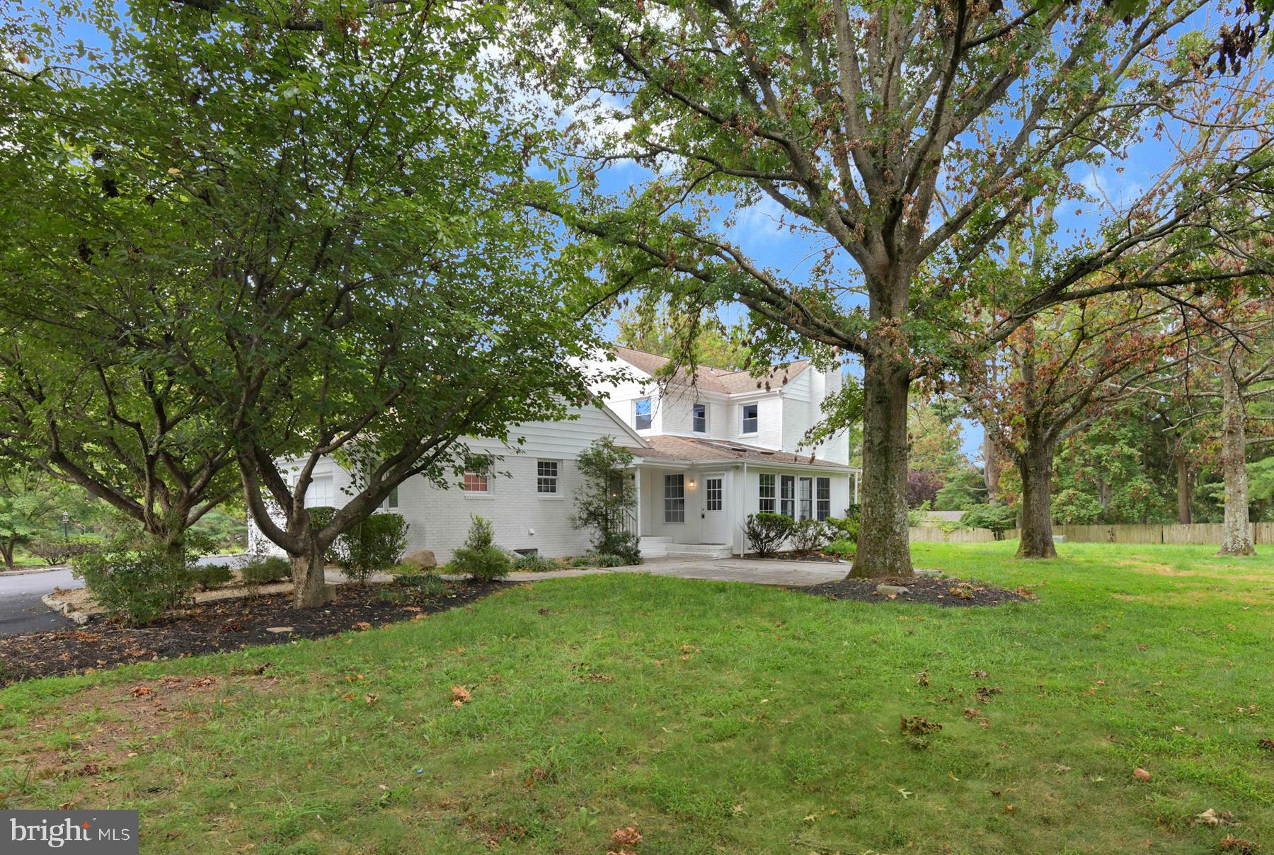 71 Carter Road Lawrence Township, NJ 08648 - Photo 31 of 33 a view of a house with a yard porch and sitting area