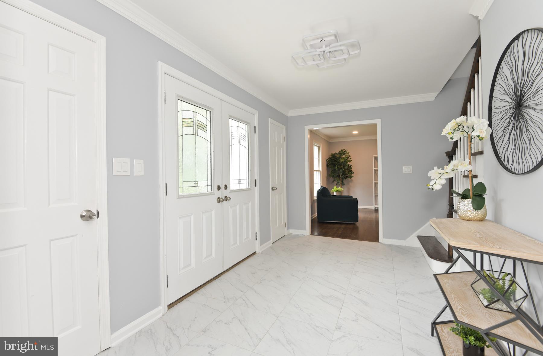 71 Carter Road Lawrence Township, NJ 08648 - Photo 5 of 33 a view of a livingroom with furniture and windows