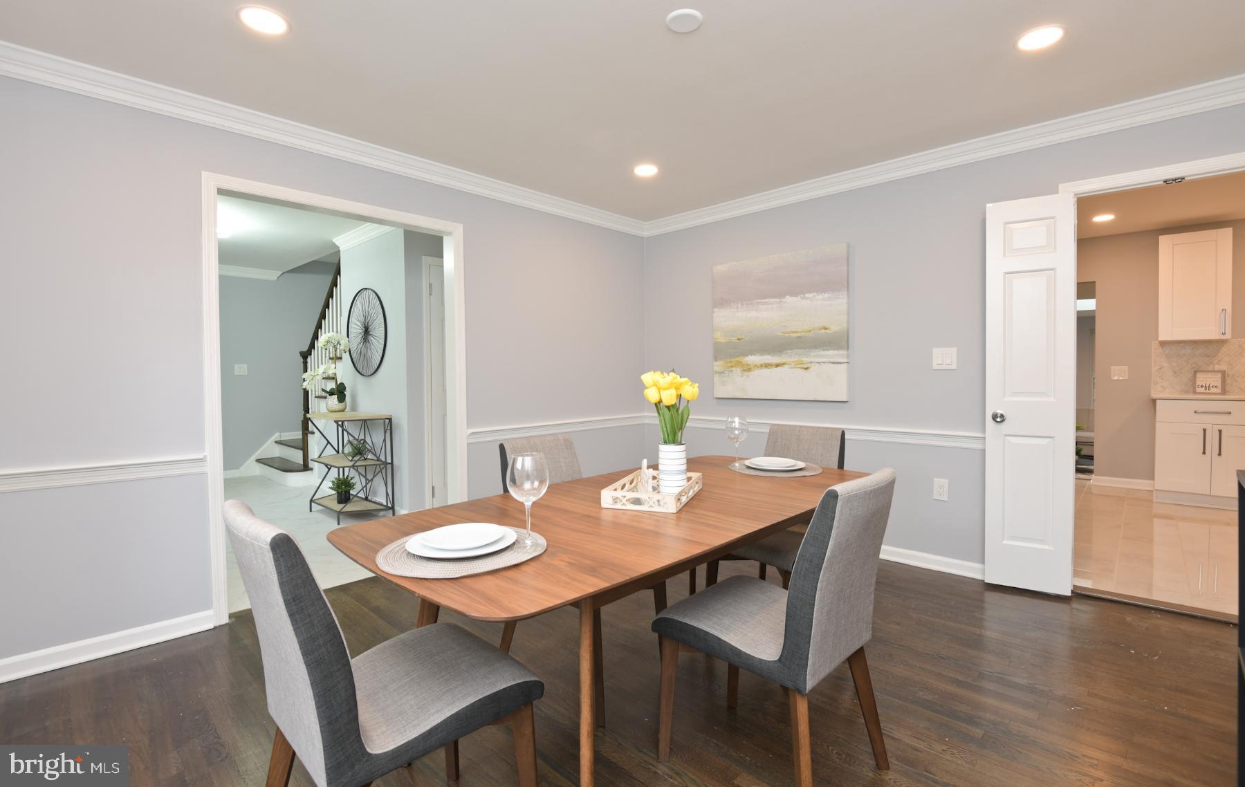 71 Carter Road Lawrence Township, NJ 08648 - Photo 8 of 33 a view of a dining room with furniture and wooden floor
