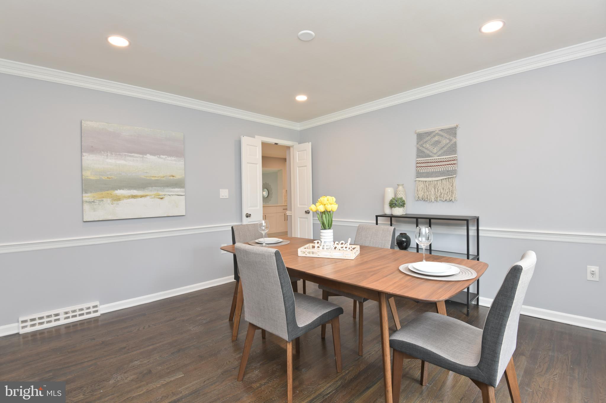 71 Carter Road Lawrence Township, NJ 08648 - Photo 9 of 33 a view of a dining room with furniture and wooden floor
