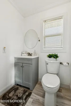 a kitchen with a sink and a refrigerator