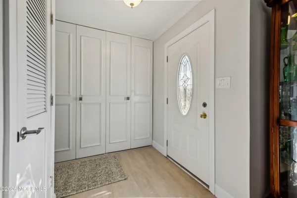 a view of a bathroom with wooden door