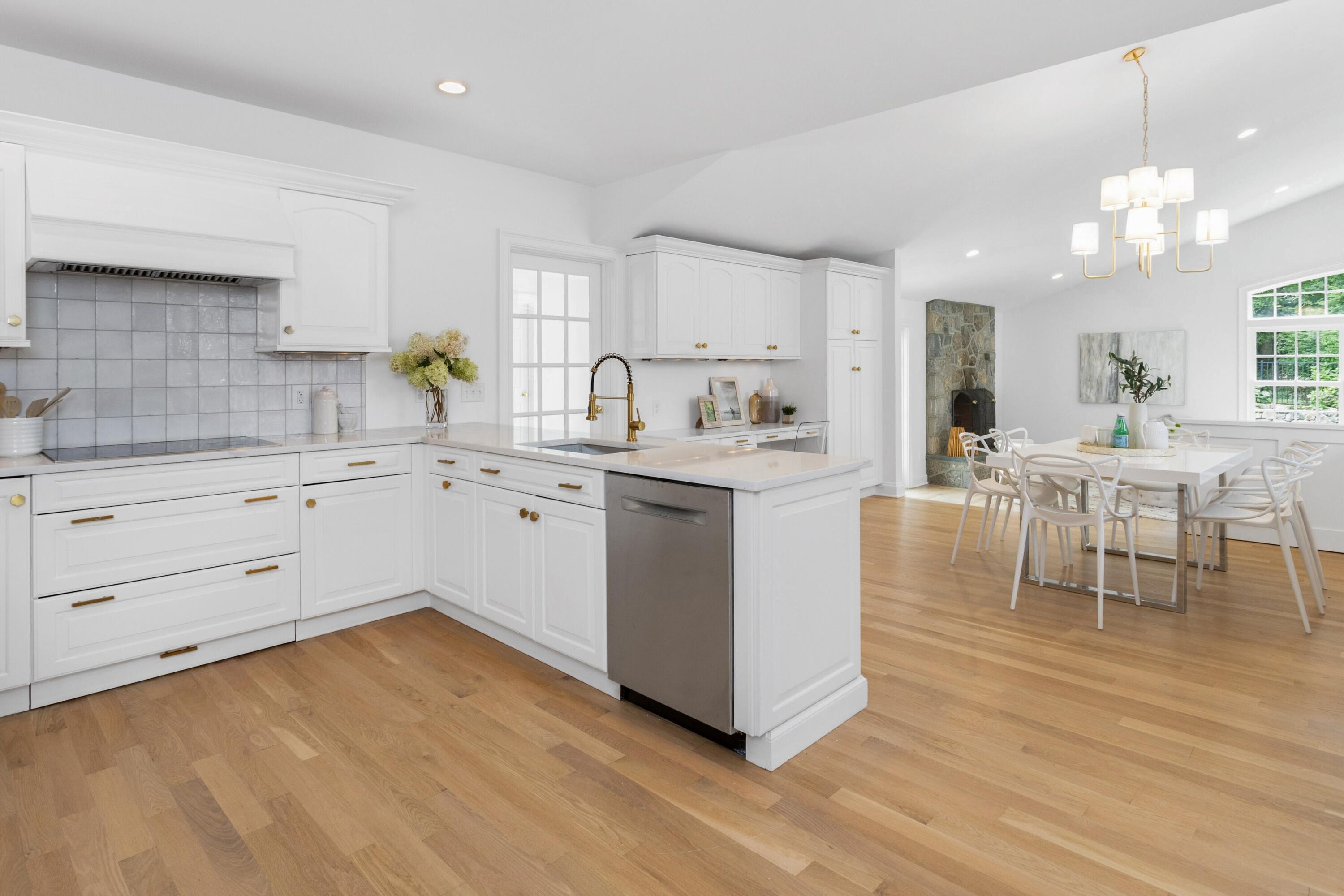 215 Leroy Avenue Darien, CT 06820 - Photo 13 of 34 a kitchen with a sink cabinets and window