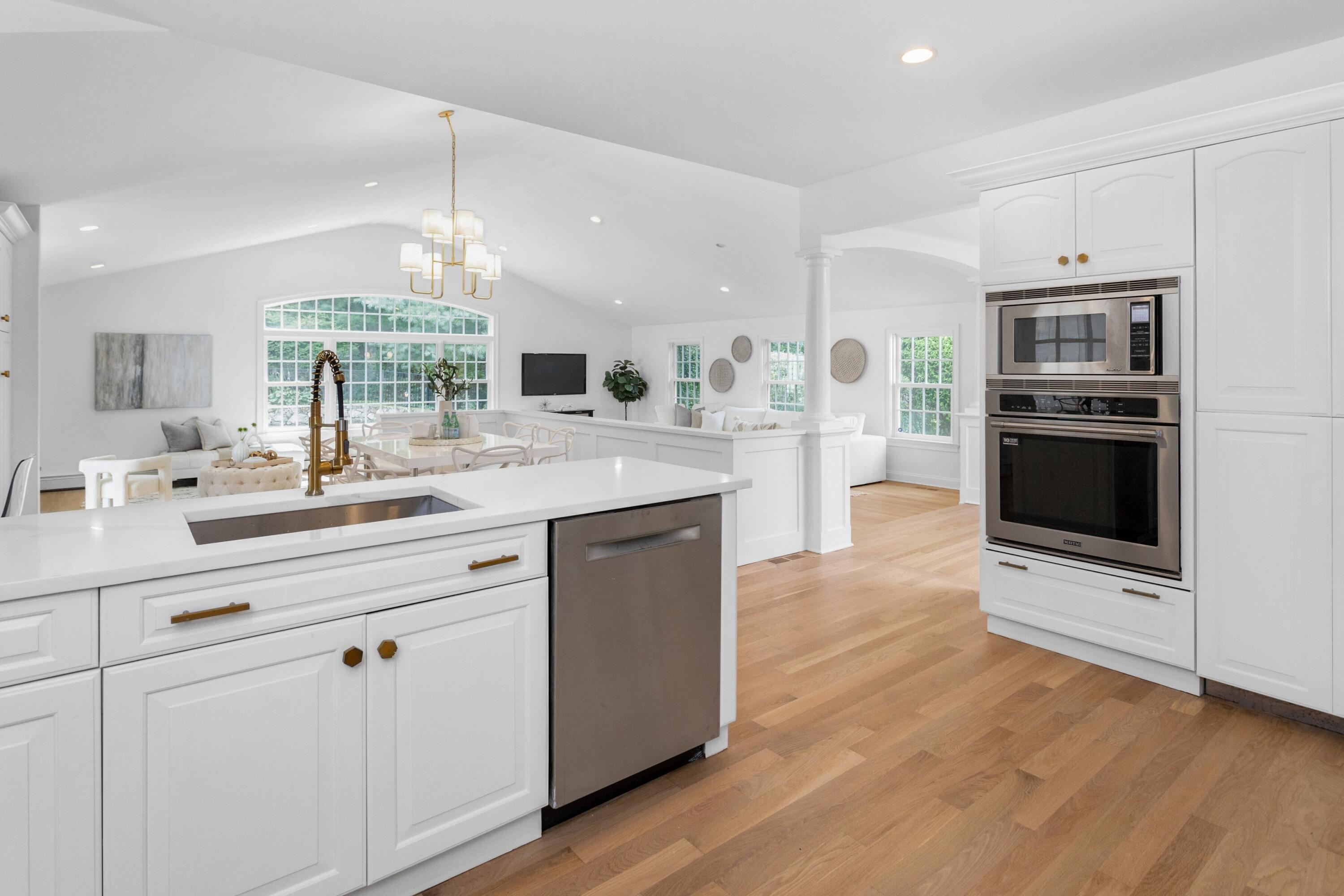 215 Leroy Avenue Darien, CT 06820 - Photo 14 of 34 a kitchen with stainless steel appliances kitchen island granite countertop a sink stove and refrigerator