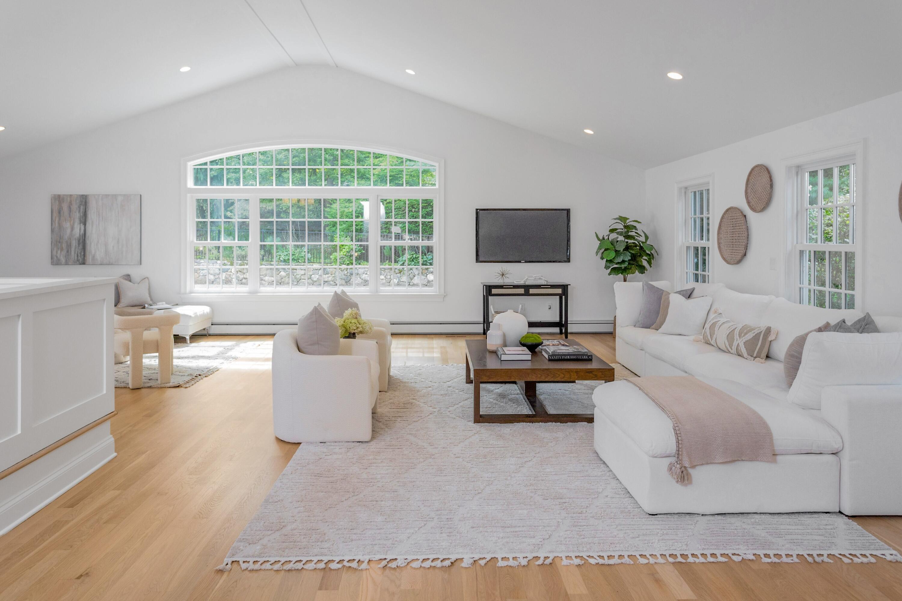 215 Leroy Avenue Darien, CT 06820 - Photo 17 of 34 a living room with furniture and a flat screen tv