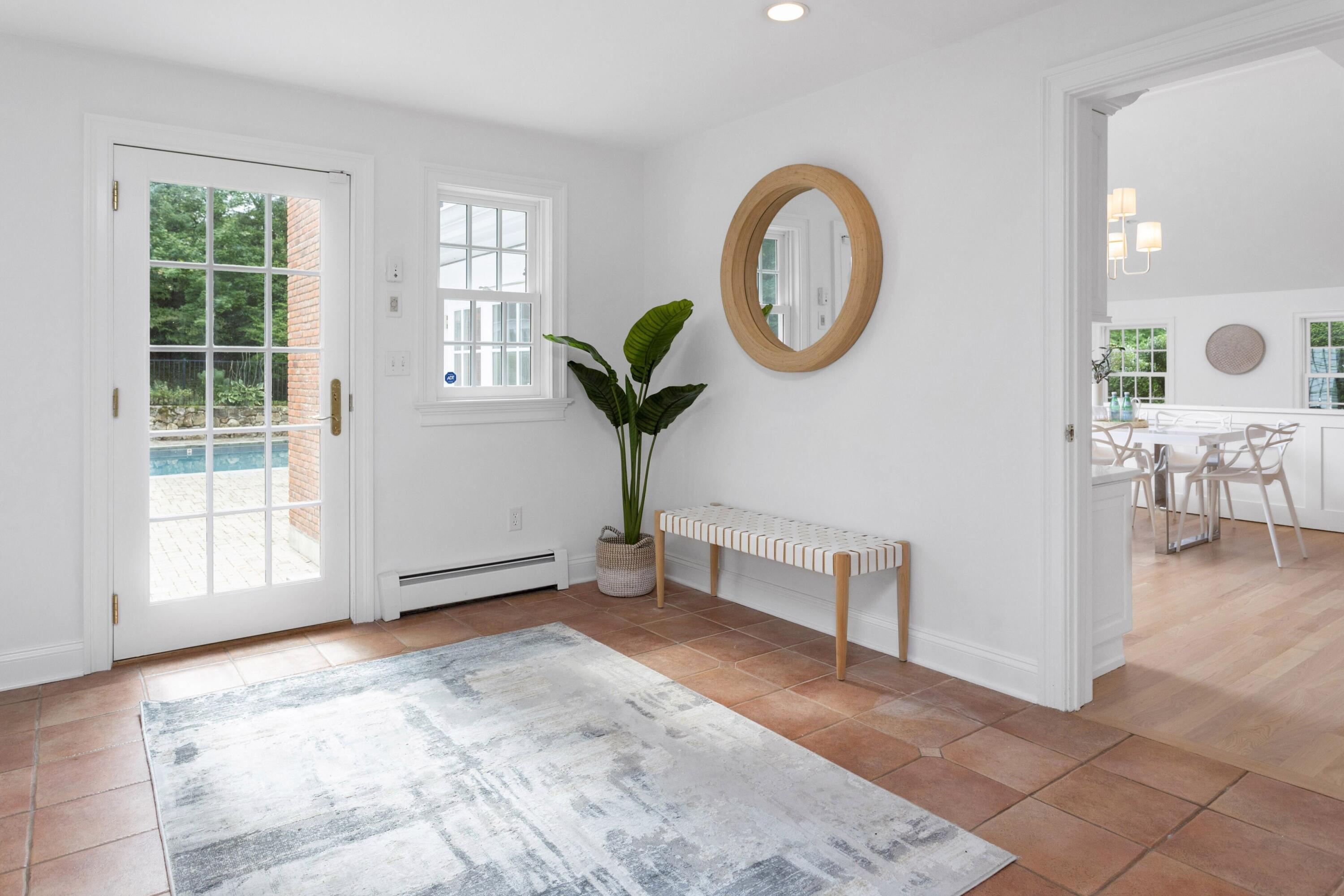215 Leroy Avenue Darien, CT 06820 - Photo 20 of 34 a view of a livingroom with furniture and a large window