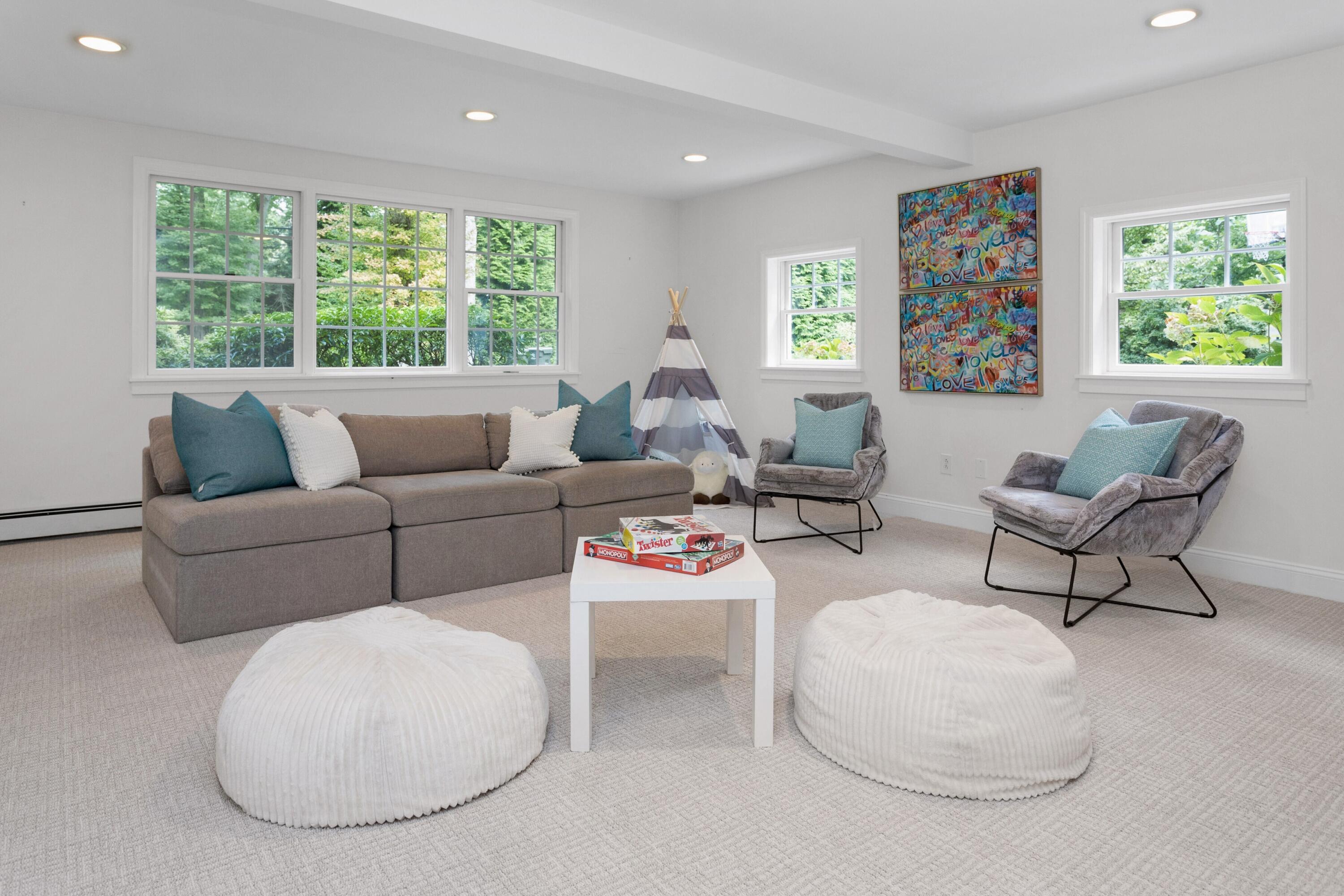 215 Leroy Avenue Darien, CT 06820 - Photo 23 of 34 a living room with furniture and a large window