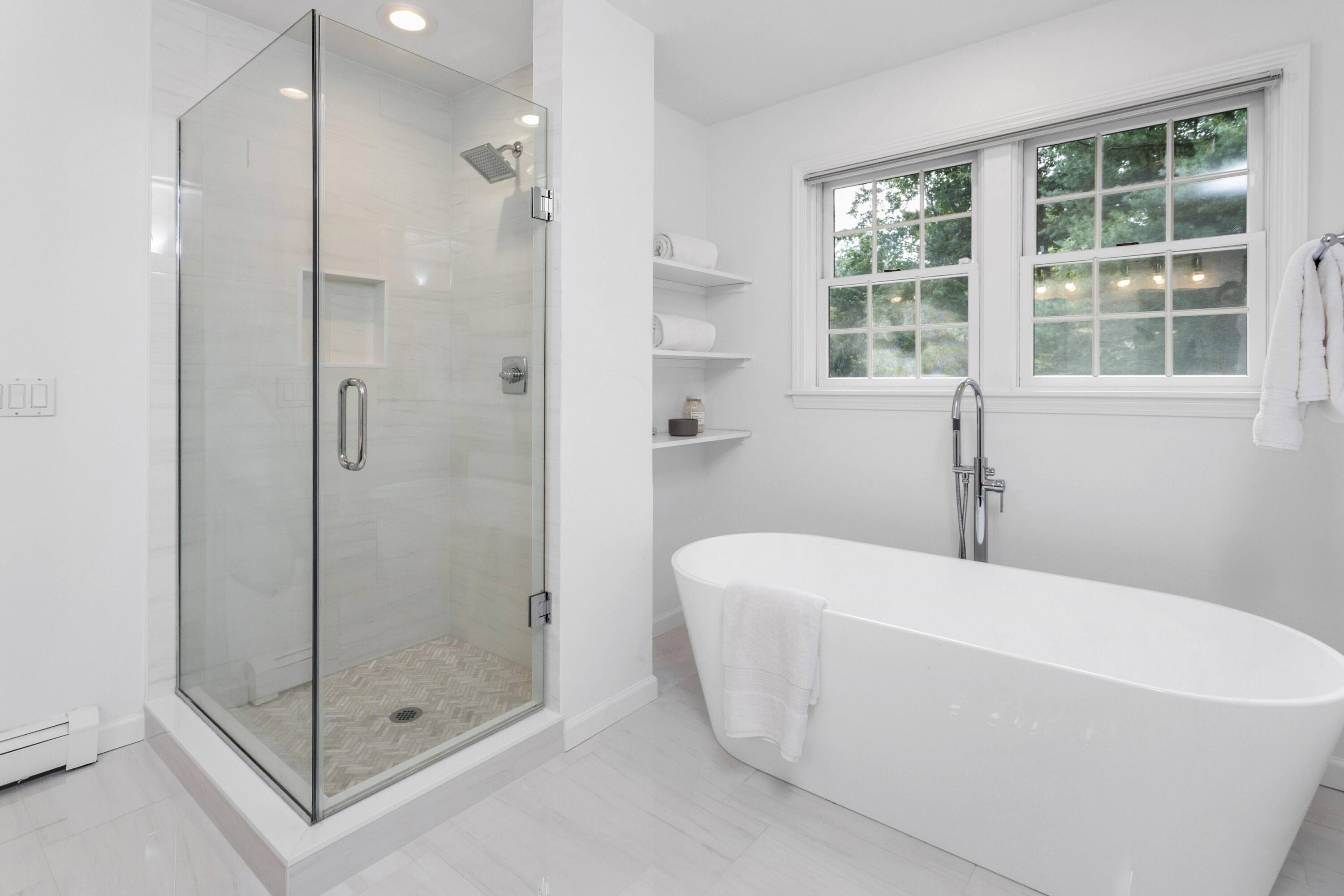 215 Leroy Avenue Darien, CT 06820 - Photo 26 of 34 a white bath tub sitting next to a shower
