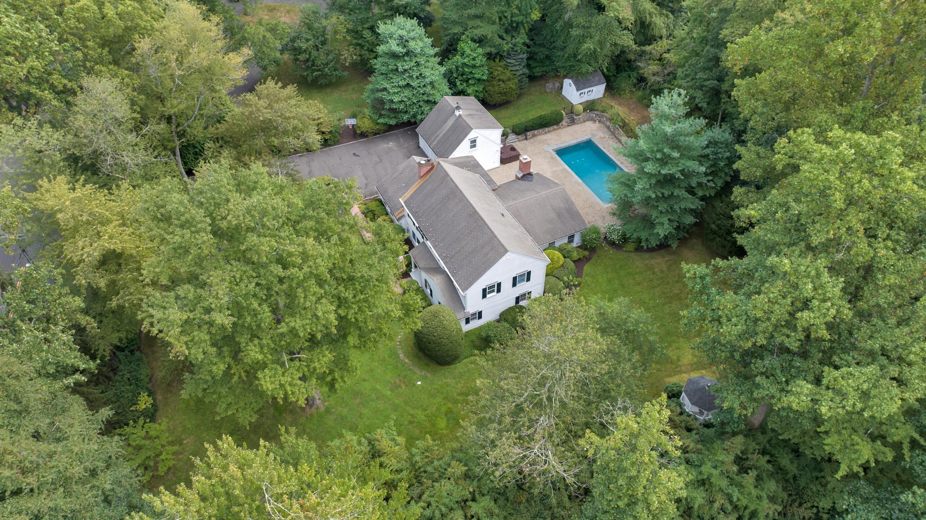 215 Leroy Avenue Darien, CT 06820 - Photo 3 of 34 an aerial view of residential house with outdoor space and trees all around