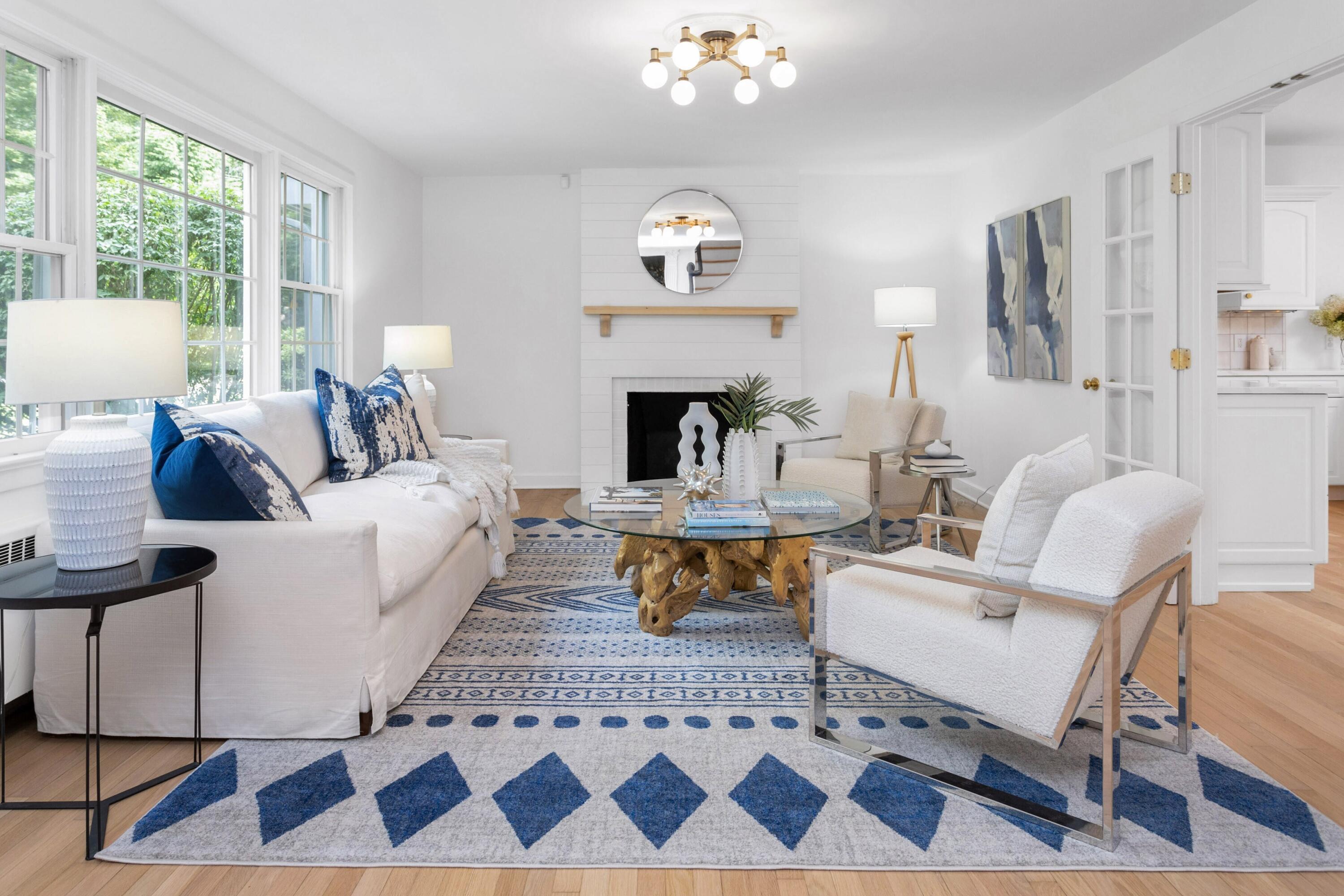 215 Leroy Avenue Darien, CT 06820 - Photo 8 of 34 a living room with furniture a rug and a fireplace