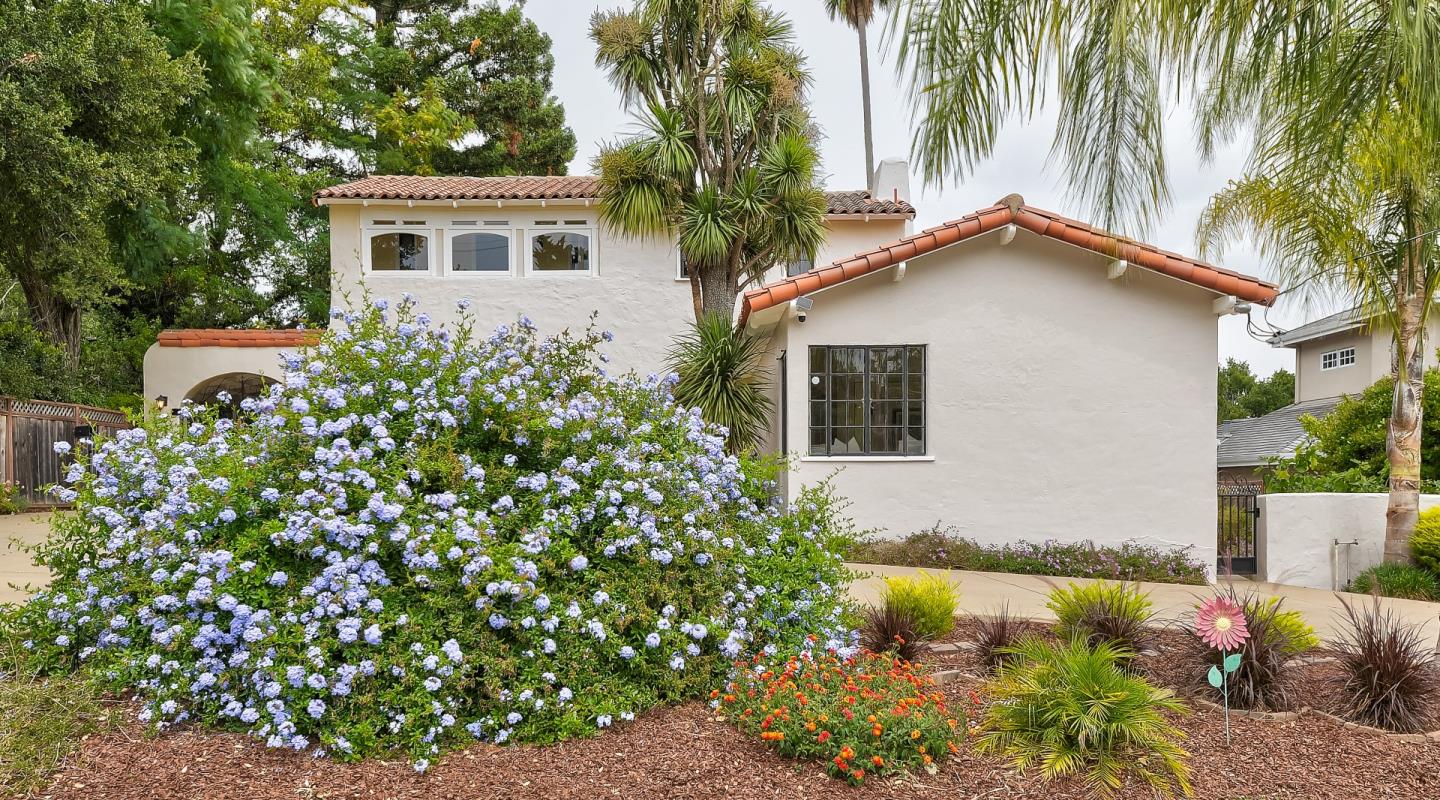 125 Alturas Drive Burlingame, CA 94010 - Photo 14 of 59 a front view of a house with a yard