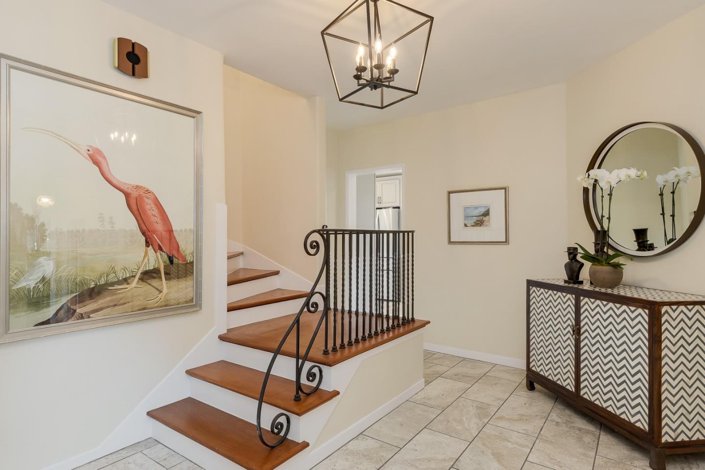 125 Alturas Drive Burlingame, CA 94010 - Photo 18 of 59 a view of a hallway with wooden floor and entryway