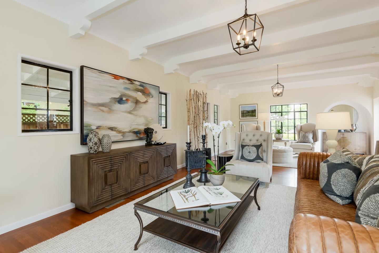 125 Alturas Drive Burlingame, CA 94010 - Photo 19 of 59 a living room with furniture a chandelier and a window