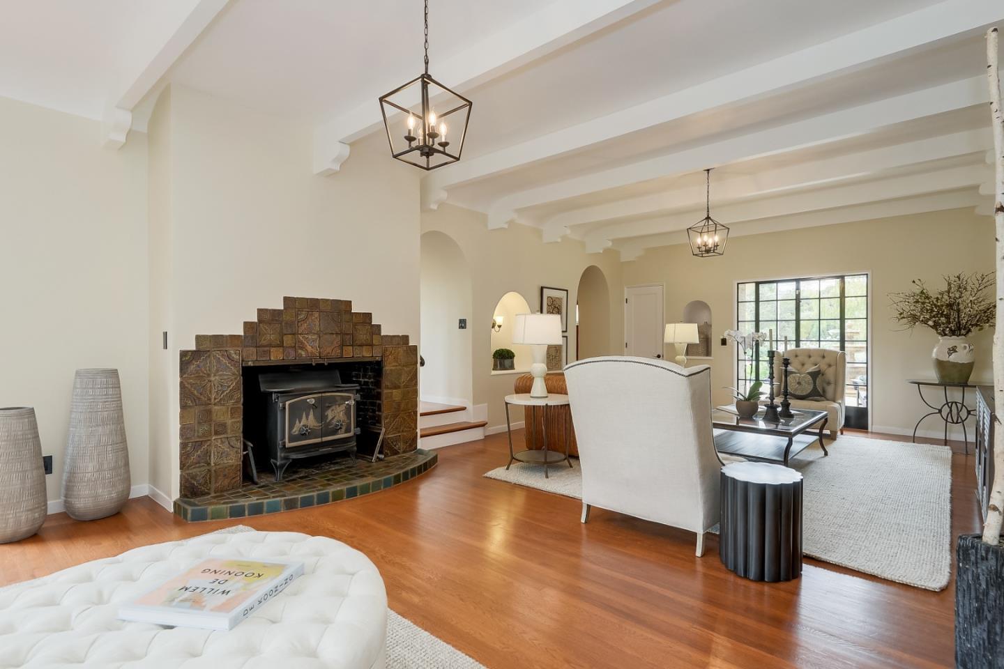 125 Alturas Drive Burlingame, CA 94010 - Photo 24 of 59 a living room with furniture and a fireplace