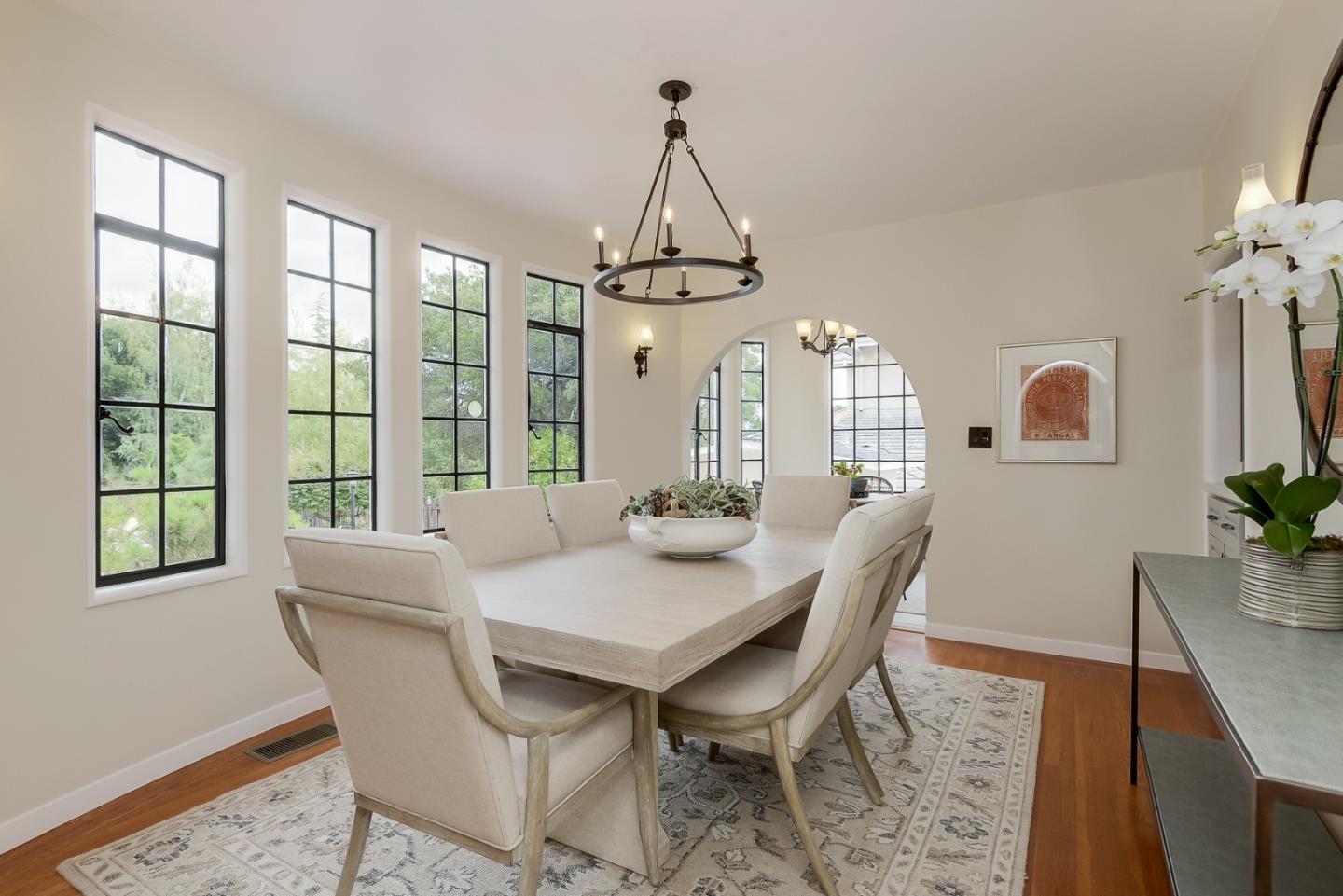 125 Alturas Drive Burlingame, CA 94010 - Photo 26 of 59 a view of a dining room with furniture window and wooden floor