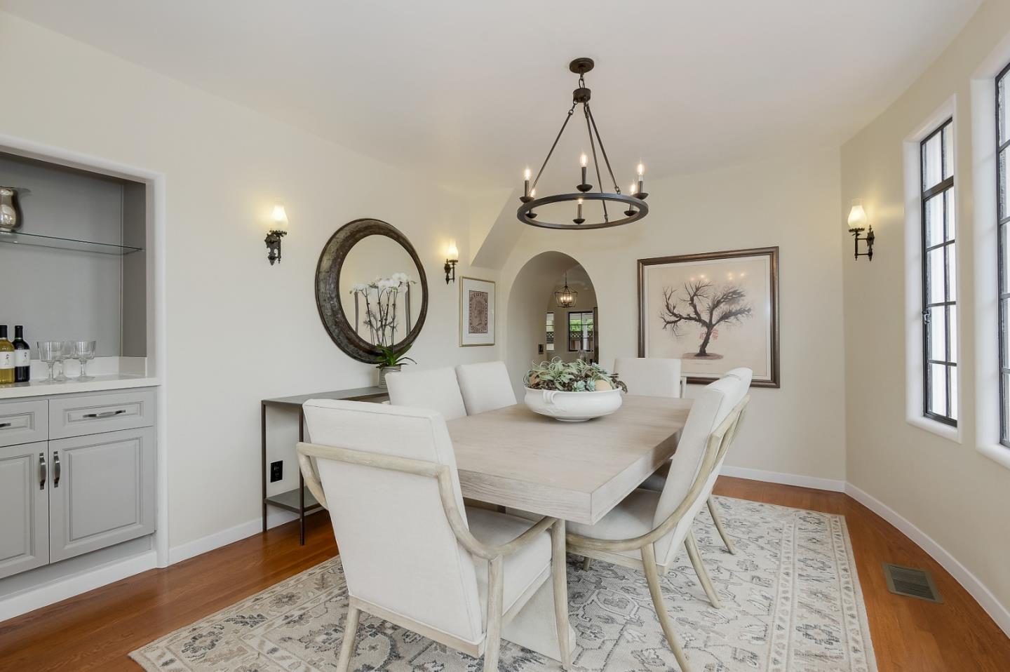 125 Alturas Drive Burlingame, CA 94010 - Photo 27 of 59 a view of a dining room with furniture window and wooden floor