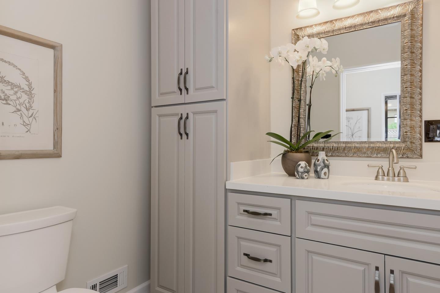125 Alturas Drive Burlingame, CA 94010 - Photo 33 of 59 a bathroom with a sink vanity granite and toilet