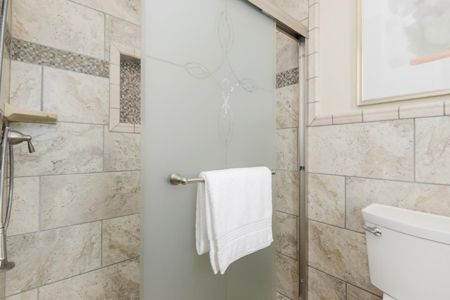 125 Alturas Drive Burlingame, CA 94010 - Photo 37 of 59 a bathroom with a shower and toilet