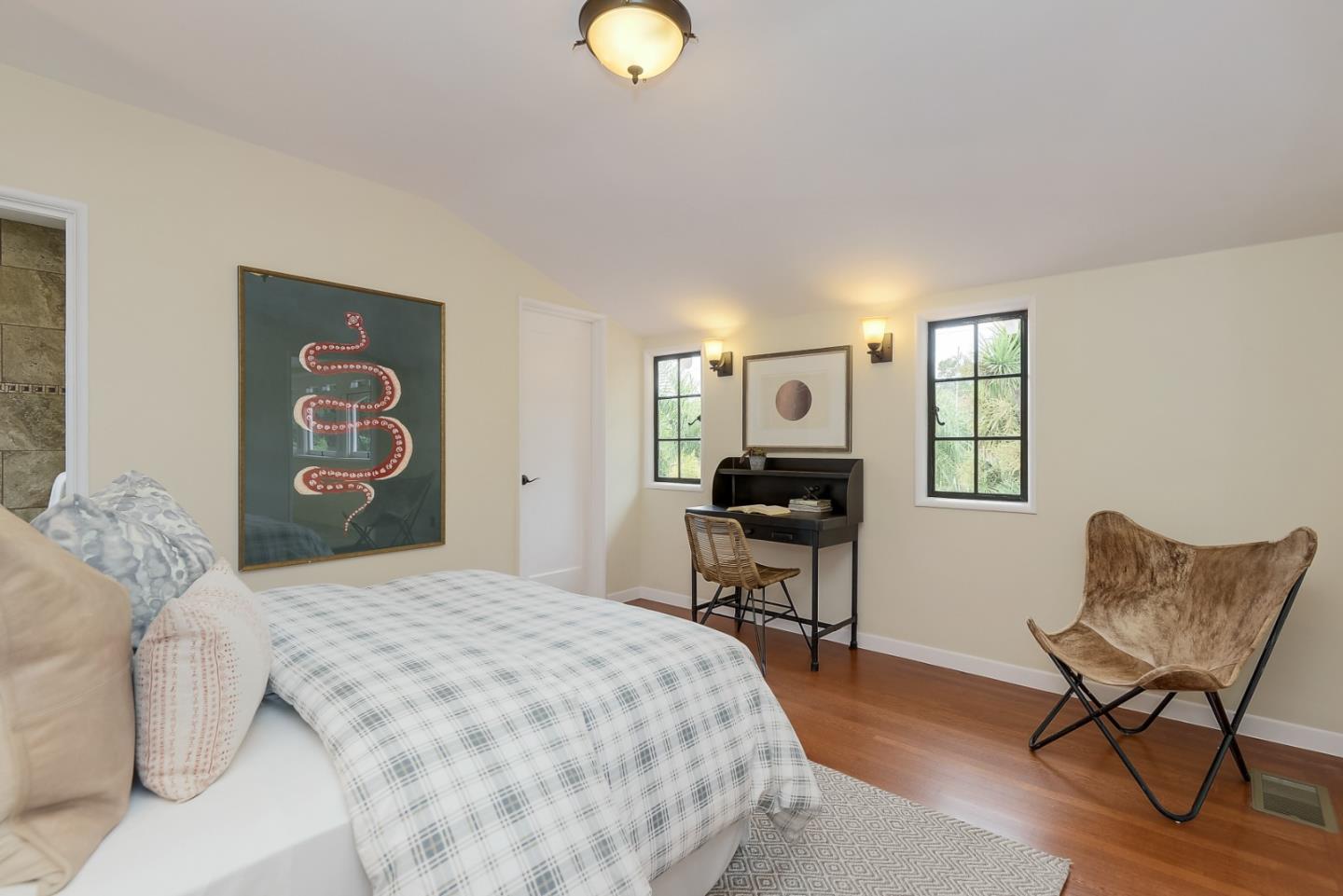 125 Alturas Drive Burlingame, CA 94010 - Photo 38 of 59 a bedroom with a bed and wooden floor