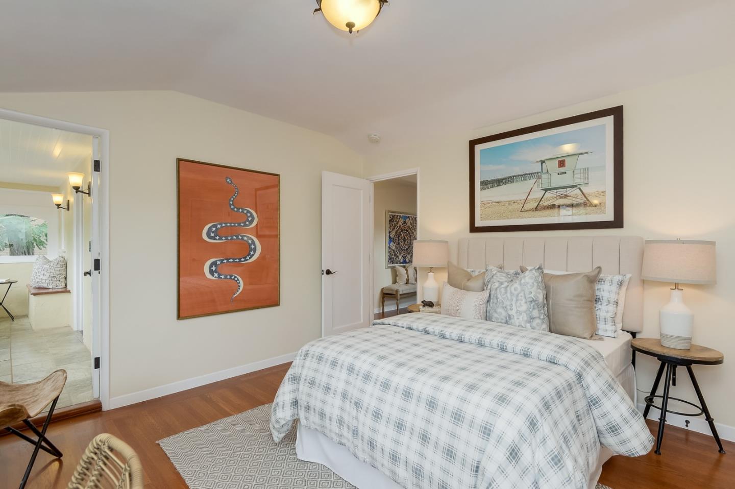 125 Alturas Drive Burlingame, CA 94010 - Photo 39 of 59 a bedroom with a bed and a painting on the wall