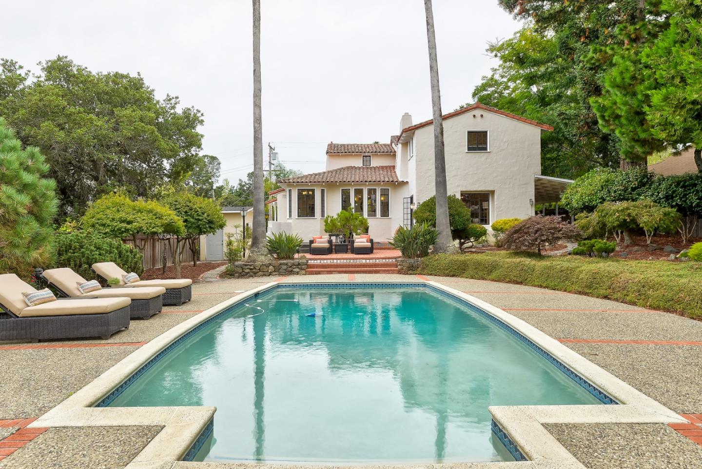 125 Alturas Drive Burlingame, CA 94010 - Photo 55 of 59 a swimming pool with outdoor seating and yard