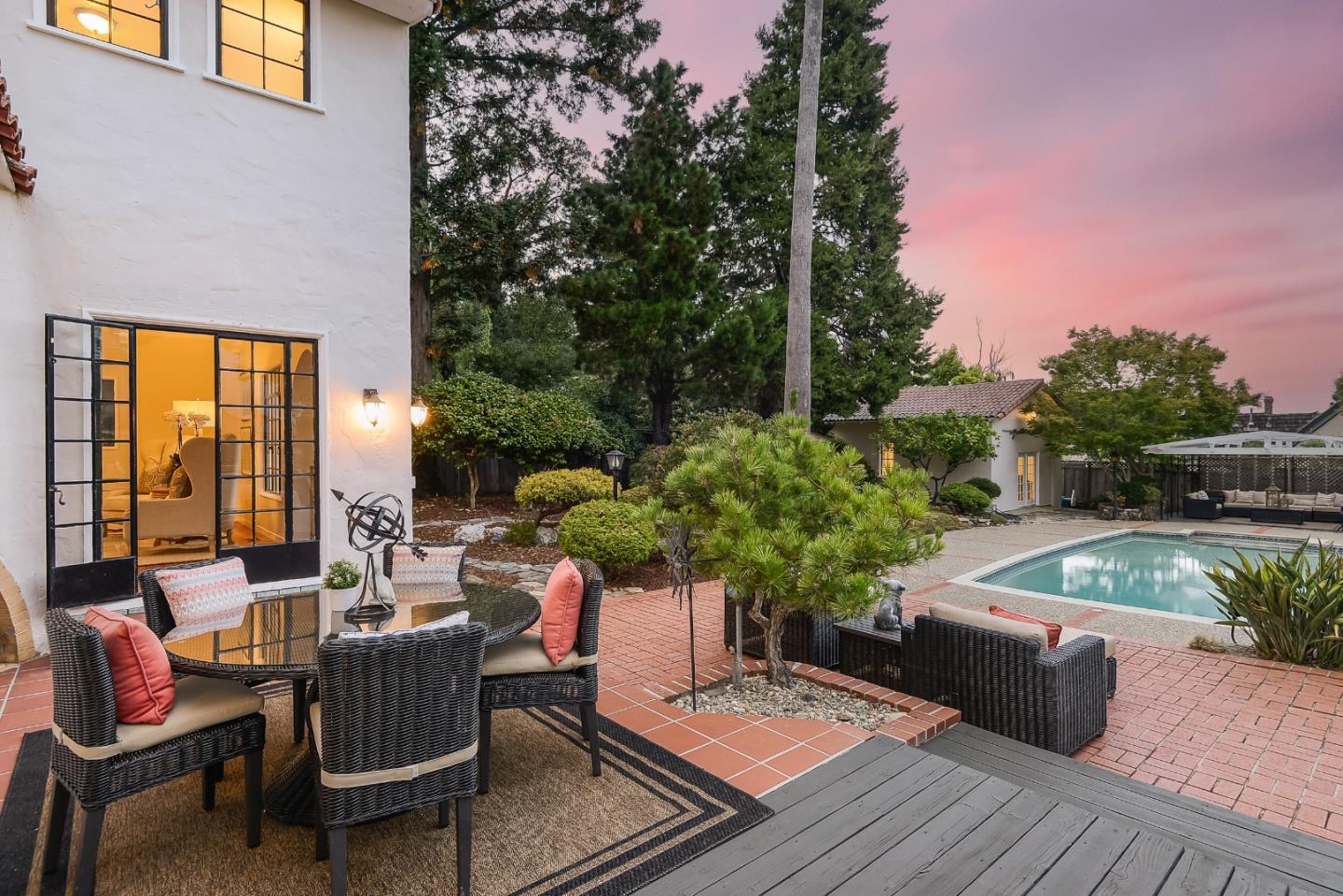 125 Alturas Drive Burlingame, CA 94010 - Photo 7 of 59 a view of a patio with couches table and chairs and potted plants