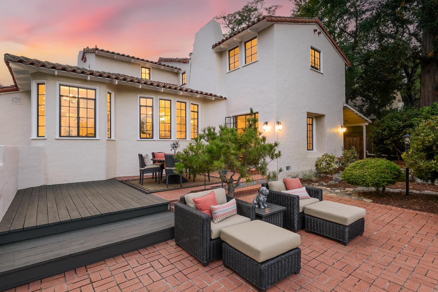 125 Alturas Drive Burlingame, CA 94010 - Photo 9 of 59 a view of a house with couches chairs and table next to a yard