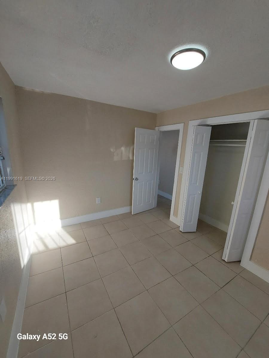 1574 Northwest 58th Street, Unit 1574 Miami, FL 33142 - Photo 5 of 10