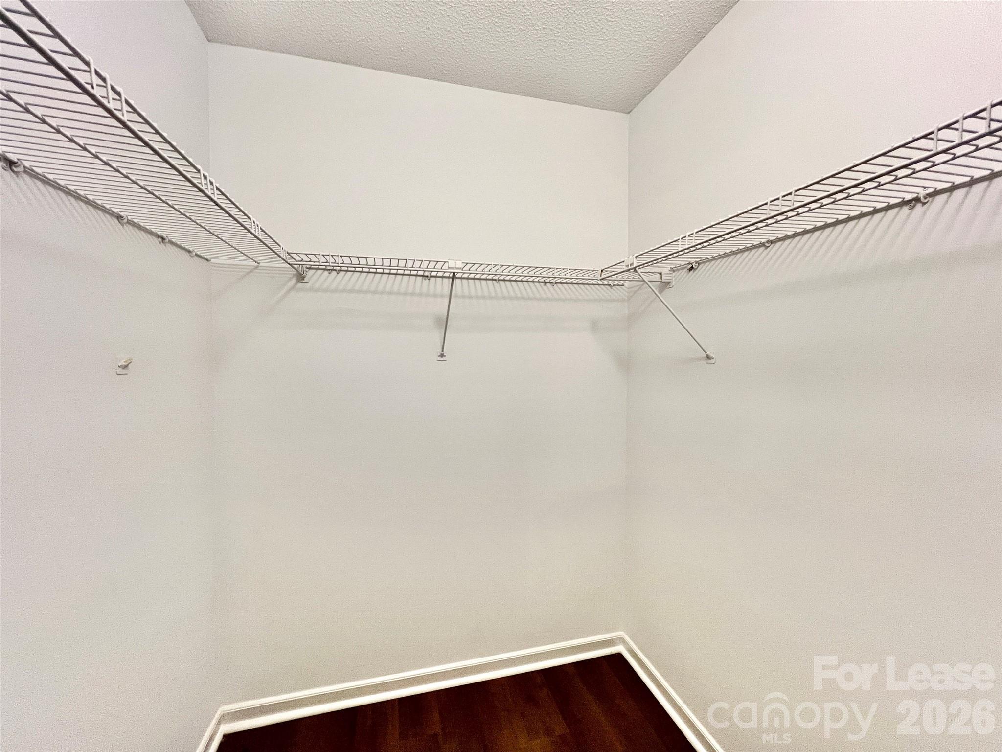 11084 Harrowfield Road Charlotte, NC 28226 - Photo 18 of 31 a view of small space with racks on the wall